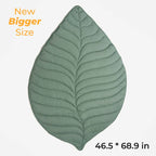 green  leaf-shaped dog blanket.