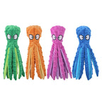Four colorful octopus-shaped toys on a white background
