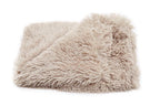 Beige fluffy blanket on a white background